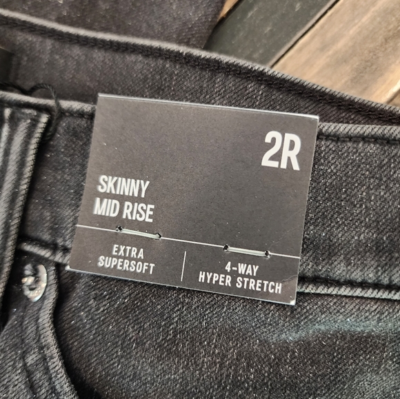 Express Mid rise 4 way hyper stretch dark gray skinny jeans - Picture 5 of 8